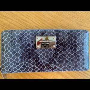 Michael Kors Snakeskin print zip around Women’s Wallet